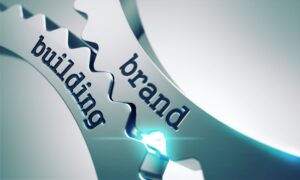 Brand,Building,On,The,Mechanism,Of,Metal,Cogwheels. | Building a Strong Cybersecurity Brand: Essential Strategies | | Si