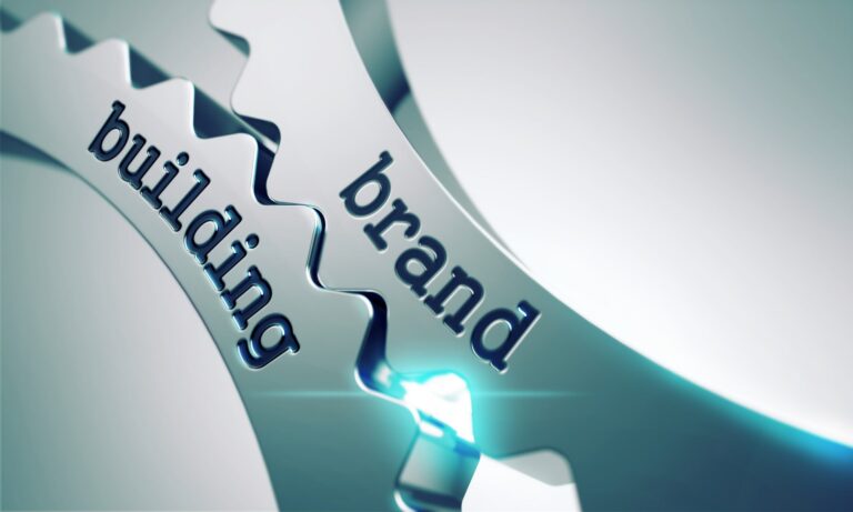 Brand,Building,On,The,Mechanism,Of,Metal,Cogwheels. | Building a Strong Cybersecurity Brand: Essential Strategies | | Si