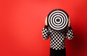 A,Human,Holding,Target,In,Front,Of,Her,Head,On | Psychology of Cybersecurity Advertising | | Site Hub