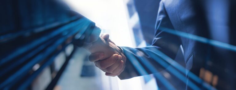 Businessmen,Making,Handshake,With,Partner,,Greeting,,Dealing,,Merger,And,Acquisition, | SMB cybersecurity social media s